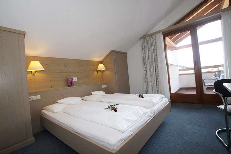 Double bed in Aquarius Apartment 3 with balcony 